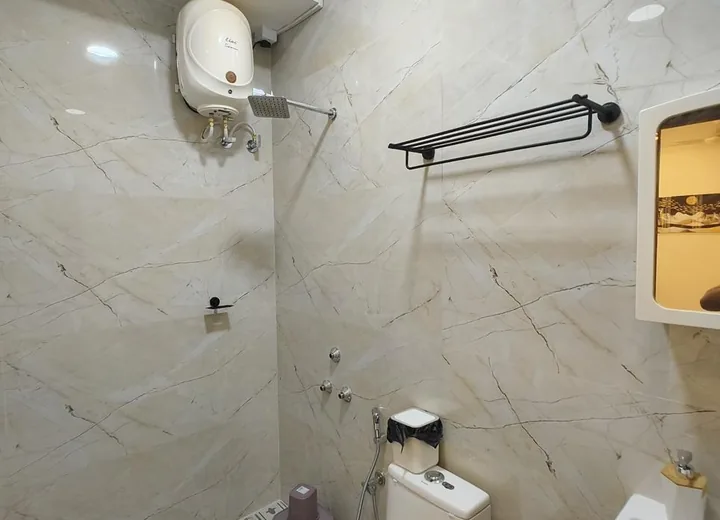 Bathroom with Geyser at Grand Residency